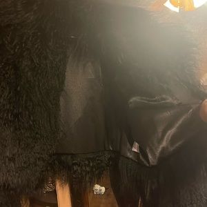 Black monglion fur coat